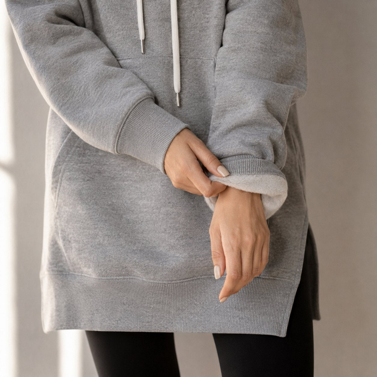 A turned-back cuff revealing the soft fleece lining